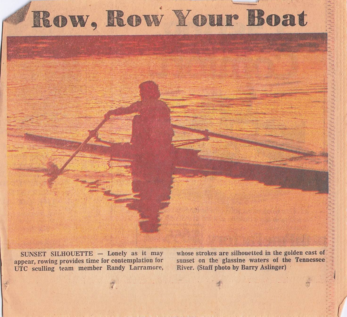 Newspaper clipping titled 'Row, Row Your Boat': UTC sculling team member Randy Larramore silhouetted in a single at sunset on the Tennessee River. Staff photo by Barry Aslinger.