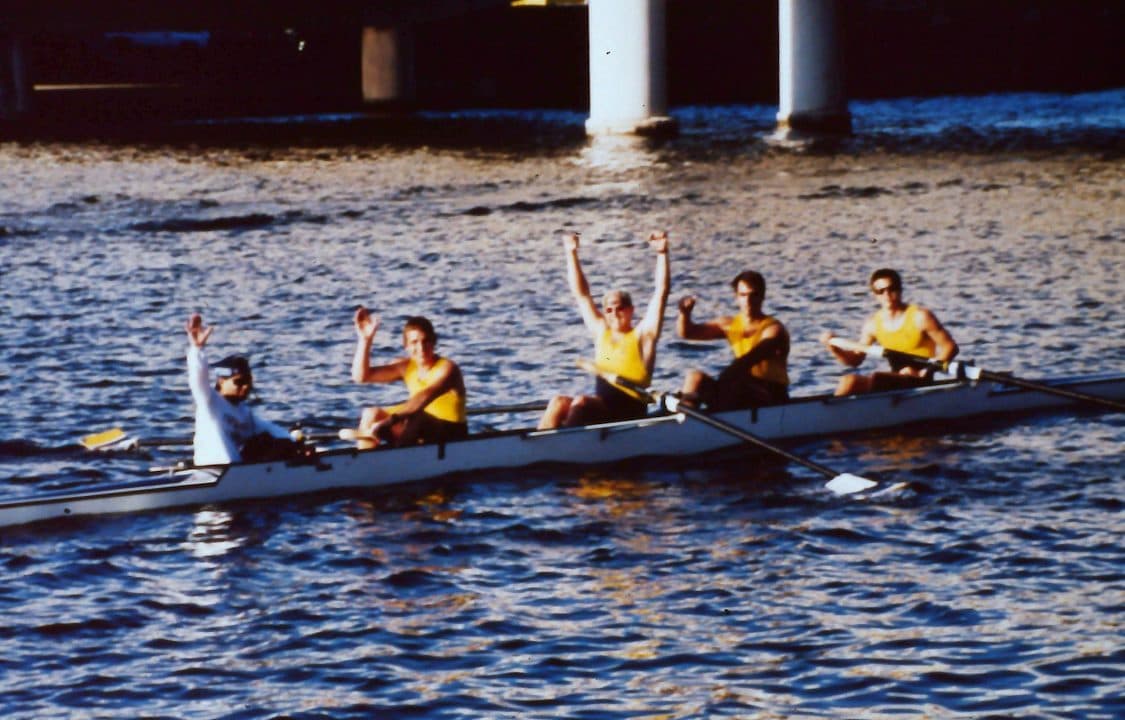 A UTC four celebrates after the finish.